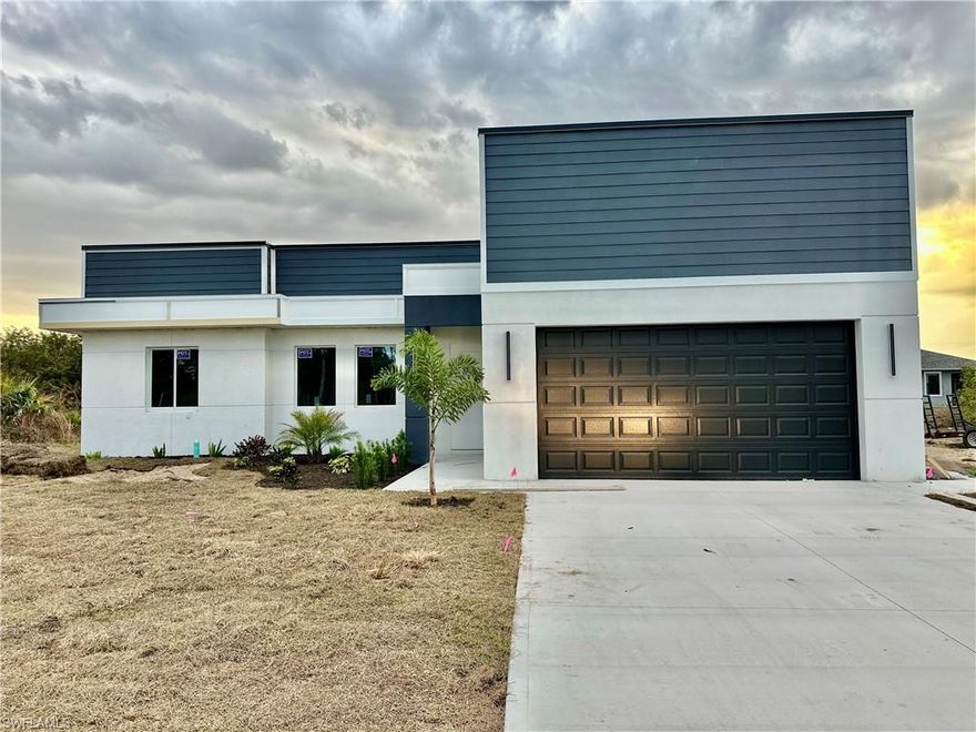 Welcome to this beautifully designed new construction home in the growing community of LaBelle, Florida. This modern 3-bedroom, 2-bath residence offers an open and inviting layout with high-end finishes throughout.

Step inside to find sleek tile flooring throughout the home, high ceilings, and abundant natural light. The stunning kitchen is the heart of the home, featuring custom cabinetry, quartz countertops, a spacious waterfall island, and plenty of storage—perfect for entertaining or everyday living.

The living area showcases a striking feature wall designed for a built-in entertainment center, adding both style and functionality. The primary suite offers a luxurious feel with a beautifully tiled walk-in shower and modern fixtures.

Enjoy Florida living outdoors on the covered lanai with plenty of space to add a future pool, creating your own private backyard retreat

Conveniently located in LaBelle, this home offers peaceful living while still being within driving distance to Fort Myers and Miami for work, shopping, dining, and entertainment. Don’t miss the opportunity to own this stylish new home with modern design and room to make it your own.