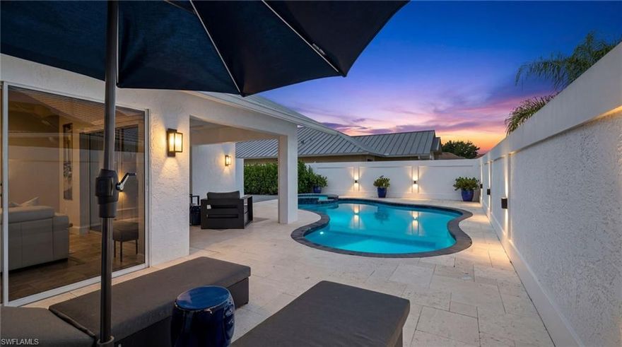 Welcome to this beautifully renovated pool home in the highly sought-after gated community of Longshore Lake in North Naples. This 3-bedroom, 2-bathroom single-family home offers over 1,600 sq ft of living space and features an open-concept layout designed for comfortable Florida living. Inside, you’ll find a bright and inviting great room with vaulted ceilings, abundant natural light, and seamless flow between the living area, dining space, and updated kitchen, ideal for entertaining or everyday living. The split-bedroom floor plan offers added privacy, while the spacious primary suite includes dual sinks, a walk-in closet, and a separate tub and shower. Glass sliding doors lead to a private lanai featuring a heated pool and spa, creating a true indoor-outdoor living experience. The desirable southwest rear exposure provides beautiful sunset views and a peaceful setting enhanced by a privacy wall. Longshore Lake is a gated North Naples community known for its exceptional amenities, including an 88-acre lake for kayaking and fishing, clubhouse with dining, fitness center, tennis and pickleball courts, walking and biking paths, community pool, and boat ramp. Conveniently located near golf courses, shopping, dining, schools, and Naples beaches, this home is well suited as a primary residence, seasonal retreat, or investment opportunity. With low HOA fees and strong lifestyle appeal, this North Naples pool home is a must-see.