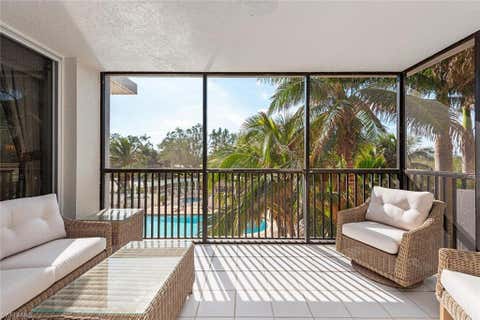 Photo of 6825 Grenadier BLVD #102, NAPLES, FL 34108 (MLS # 225077569)