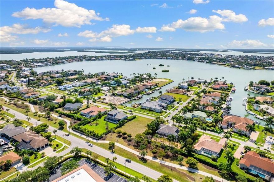 Discover your own piece of paradise on Marco Island! This generously sized 0.43-acre lot has been fully cleared, providing the perfect canvas for your dream home overlooking the tranquil canal. Picture yourself basking in breathtaking sunset vistas from a second-floor terrace! Positioned less than 2 miles from the beach entrance and just moments to shopping and delectable dining, this location epitomizes the laid-back essence of island living. Nestled on the largest of the Ten Thousand Islands, this area is a haven for fishing enthusiasts, boasting some of the world's premier year-round fishing spots. With no HOA fees or rental constraints, you can effortlessly curate the ultimate retreat—whether it's a seasonal getaway or your forever abode. Seize this extraordinary opportunity to transform your island dreams into a reality!