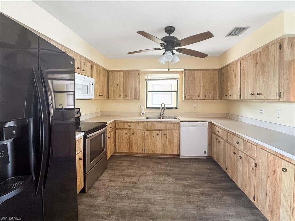 Photo of 27671 Bay Point LN #A3, BONITA SPRINGS, FL 34134 (MLS # 226027413)