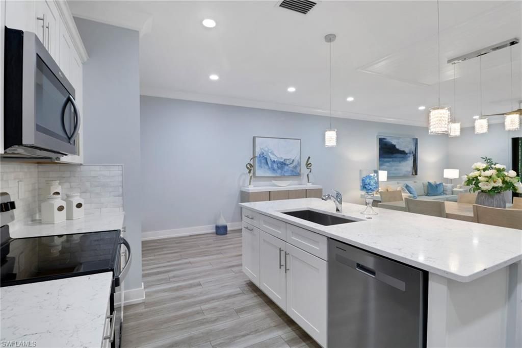 Photo of 12973 Pembroke DR, NAPLES, FL 34105 (MLS # 226010196)