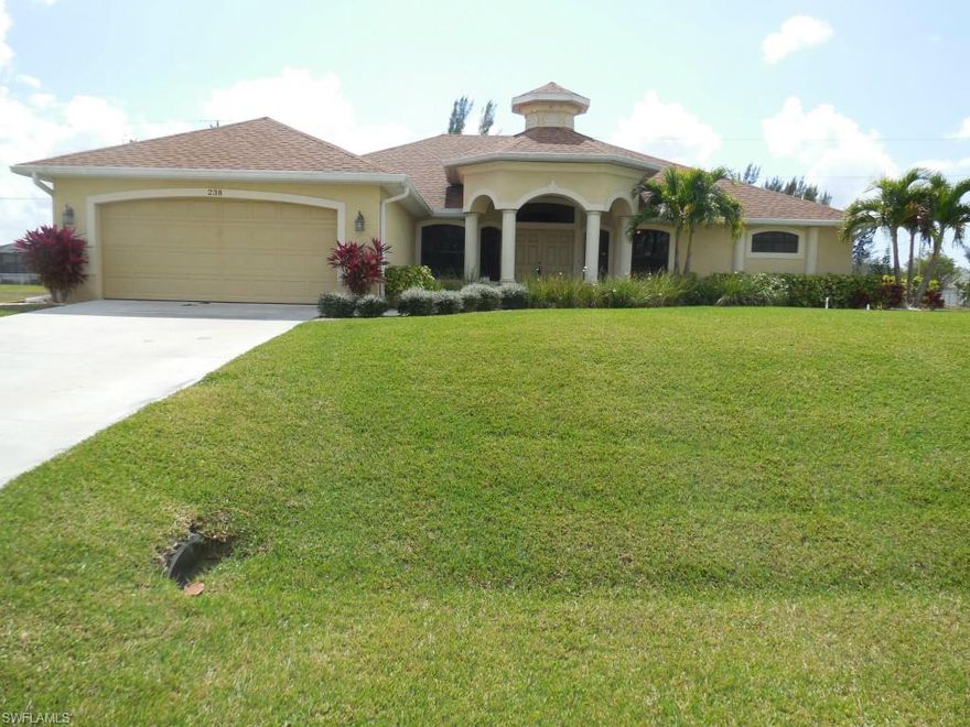Immaculate four bedroom three full bathroom pool home available in Cape Coral. Located in  a very quite neighborhood which is centrally located near Cape Coral High School and shopping. All freshly painted and ready to move in. Triple lot measures 120 feet by 125 deep and features quality landscape and well manicured lawn. The kitchen has updated  counter tops, wood cabinets and stainless steel appliances. Two master bedrooms!The main master features a jet tub and a large shower. The other master features the pool bath. The pool deck is over sized with a  paved deck floor giving it a  very tropical look and feel. All in excellent condition.