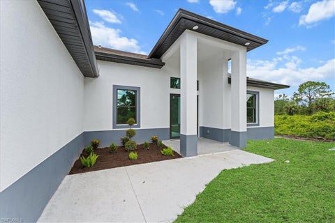 Photo of 622 Beach AVE S, LEHIGH ACRES, FL 33974 (MLS # 226038253)