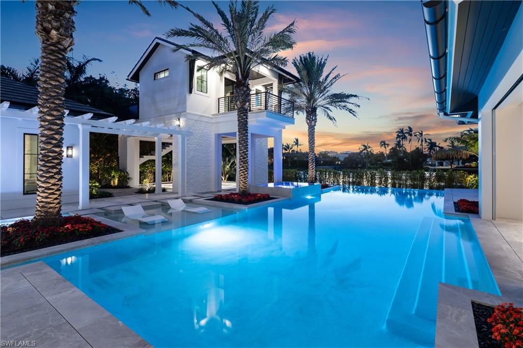 Photo of 616 BOUGAINVILLEA RD, NAPLES, FL 34102 (MLS # 226015674)