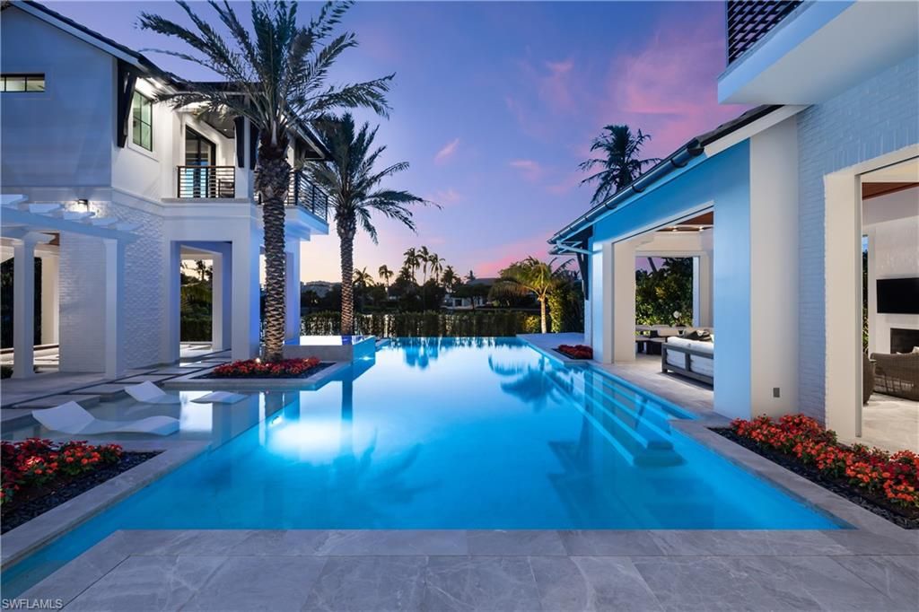 Photo of 616 BOUGAINVILLEA RD, NAPLES, FL 34102 (MLS # 226015674)