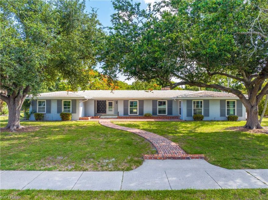 Welcome to 1369 Wales Dr, a charming ranch-style home nestled on the river side of McGregor. This property, set on almost one acre of land, is a hidden gem waiting for a touch of TLC to reveal its full potential. 

As you approach the property, you are greeted by a picturesque scene of large, mature oak trees that frame the front of the house, creating a serene and inviting atmosphere. The painted brick exterior adds a touch of rustic charm, while the cozy front porch beckons you to sit and enjoy the tranquility of the surroundings. 

Step inside to discover a spacious open living area, boasting soaring wood panel ceilings that add a sense of grandeur and openness. Two fireplaces add a cozy touch, perfect for those chilly evenings. The mid-century modern design is evident throughout, offering a unique blend of vintage charm and modern comfort. 

The home features four large bedrooms and four baths plus a den/office, providing ample space for a growing family or for hosting guests. The interior laundry room, with its solid concrete walls, offers practicality and convenience. 

One of the standout features of this property is the large and private backyard. It's the perfect canvas for creating your dream outdoor space, whether that's a lush garden, a children's play area, or a relaxing retreat. 

Despite its river side of McGregor location, this property does not require flood insurance, offering peace of mind and financial savings. The location on the river side of McGregor is highly sought after, known for its beautiful scenery and peaceful atmosphere. 

This home is a diamond in the rough, ready for the right owner to bring it back to life. With its unique features, prime location, and potential for customization, 1369 Wales Dr is a rare find. Don't miss out on the opportunity to make this house your dream home.