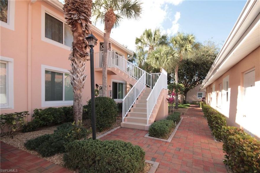 Enjoy the water feature view from the comfort of the glassed in/screened lanai nicely equipped with a summer kitchen. Presenting an open layout in the kitchen, this light & bright 2BR/2BA END unit offers extra windows, vaulted ceilings, tiled living areas and carpeted bedrooms, a full laundry room and private 1 car garage. The master suite offers private sliding door access to the lanai, dual sinks in the master bath as well as a walk-in closet. Located in a resort style gated community w/clubhouse screened lanai overlooking a 600’ lazy river pool, tennis, lap pool & more! Close to shops, dining and entertainment.