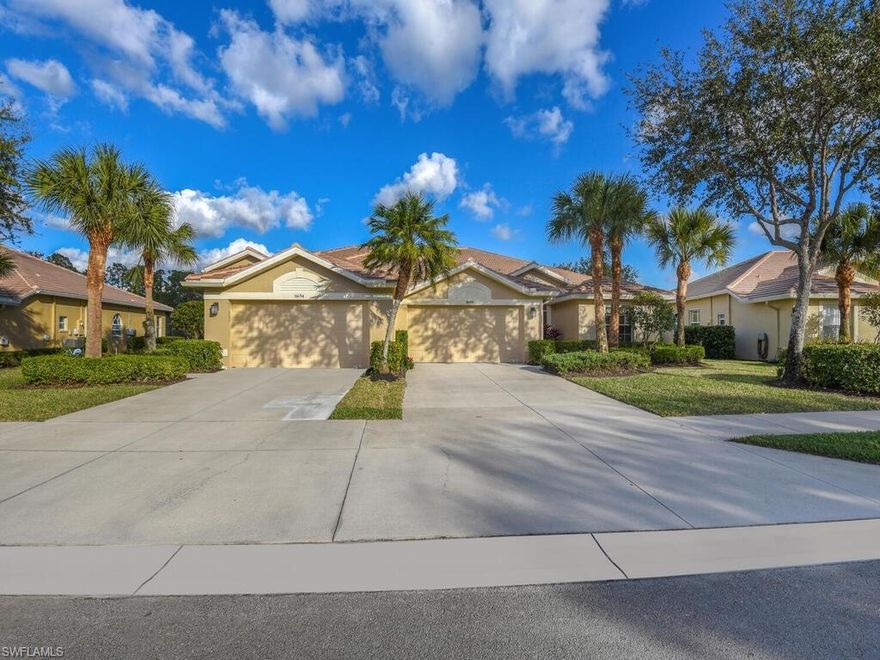 Beautifully decorated villa with two car garage and the best location and views in Cedar Hammock. Located close to the clubhouse with views to the East of the golf course, water and distant preserve.  The owners have meticulously maintained this home.