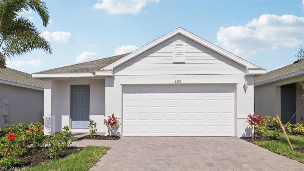 Photo of 2678 Soft Coral WAY, NORTH FORT MYERS, FL 33903 (MLS # 226015959)