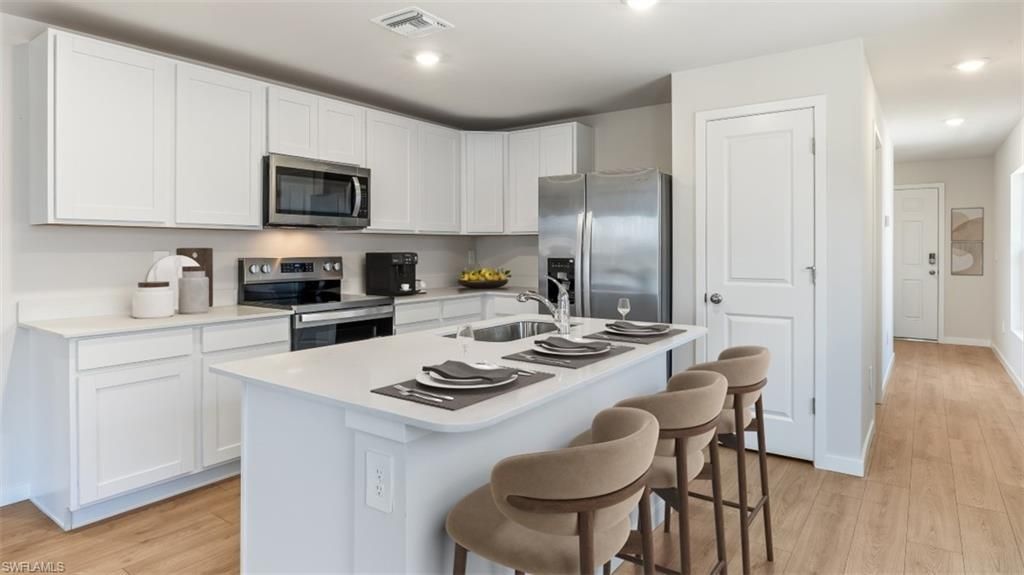 Photo of 2678 Soft Coral WAY, NORTH FORT MYERS, FL 33903 (MLS # 226015959)