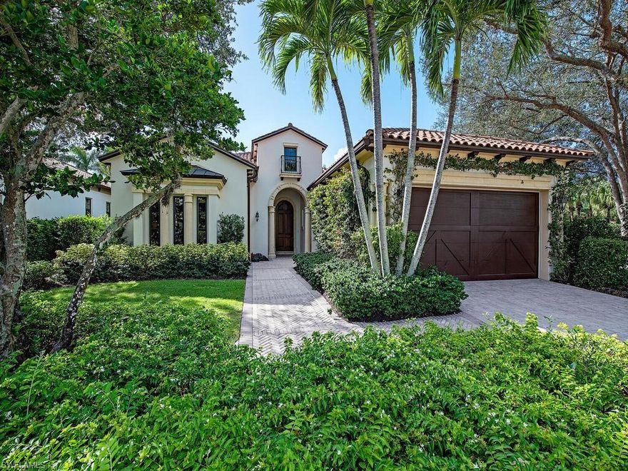 Enjoy 3 spectacular golf courses with Grey Oaks’ newly enhanced Sports Membership with Limited Golf Waitlist.  Revel in Naples luxury at this detached villa in The Estuary at Grey Oaks, boasting western sunset views over a serene lake & the 16th green of The Estuary golf course. Spanning 3503 SF, the home features 3 beds+den, 3.5 baths, a 2-car garage & a golf cart garage. Recent renovations have transformed the interior, creating a modern, sought-after floor plan with an open kitchen, split bedrooms, & a spacious office that can be used as an occasional bedroom. Updates include a new chef's kitchen, gorgeous wide-plank white oak flooring & a lavish primary bath with a freestanding tub & oversize shower. Embrace Naples' glorious weather in the covered outdoor living area, complete with a gas fireplace, outdoor kitchen with gas grill & a private pool/spa. Impact windows/doors, 12'6 to 13'6 double tray ceilings & dual walk-in closets in the primary suite add to the home's allure. Ideally located only 10 mins from Naples’ beaches & 5th Ave South. Don’t miss your opportunity to live the Grey Oaks lifestyle in this meticulously upgraded residence.