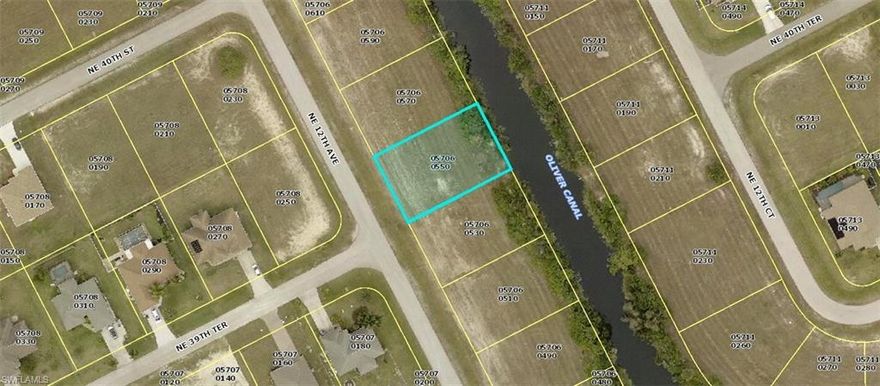 Freshwater Canal Front home site in Gator Circle area of NE Cape Coral.  North East Rear exposure, priced for quick sale.  Owners have 4 total freshwater front building sites in this area, all listed for sale at $35,000 per buildable lot.
Contact your agent for details today!