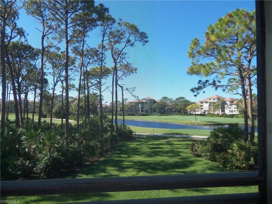 Fantastic view of golf course, lakes and sunsets from this second floor, two bedroom, two bath condo with king bed, and two twin beds, close to swimming pool, hot tub, tennis courts and gas grills.  Enjoy basketball, tennis and bocce ball courts, picnic areas, playground, fishing piers, free canoe rentals, butterfly gardens, boardwalk to the back bays, and miles of bike and walking trails.  Have a nice dinner at Back Water Jacks or rent a boat at the Marina.  Join the Bonita Bay Club and enjoy golf, tennis and fitness center and fine dining.  This unit can be leased by the day or week or month, great income producing property, can earn more than $36,000 per year.  Vacant so show your clients today!  Open House Sunday, March 4th from 1-4 PM.