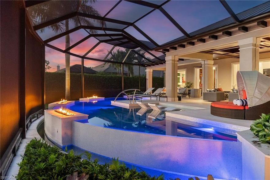 A residence conceived with the poise and indulgence of a world-class Las Vegas retreat—nestled within the exclusive enclave of Bonita Bay. Commandingly set along the 18th fairway of the Marsh Course, this 2022 architectural statement by Harwick Homes, in collaboration with renowned designer Sherri DuPont, redefines bespoke living through an extraordinary fusion of artistry, innovation, and precision craftsmanship. Each space within the home reflects a distinct vision of grandeur: five ensuite bedrooms plus a study, framed by expressive architecture and opulent material selections. The interiors unfold like a private gallery—where custom furnishings, commissioned art, and sculptural lighting create a cinematic interplay of texture, color, and form. Every detail was conceived not simply to impress, but to immerse. The outdoor realm rivals a five-star resort, with expansive terraces, tranquil water features, and a resort-caliber pool environment that transitions seamlessly from day to dusk, overlooking the course’s most dramatic vistas. Entertaining flows effortlessly between interior and exterior spaces, each crafted for both lavish gatherings and quiet reflection.