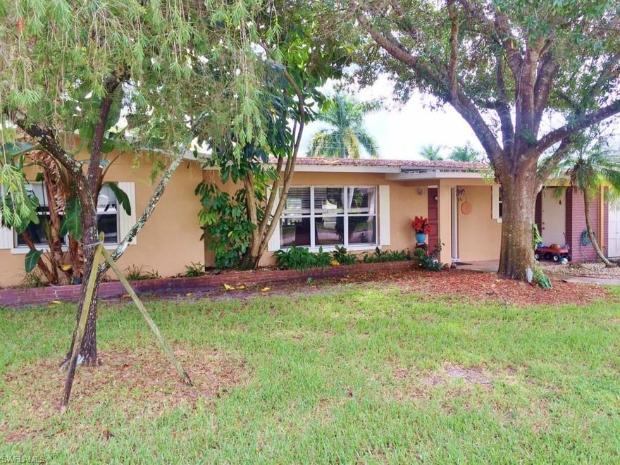 Fantastic 4 bedroom pool home off of McGregor.  Very open floor plan with updated kitchen.  This home features  a two car attached carport and a one car garage, tile throughout the main living area, large spacious bedrooms, and a screened in pool.  Very nice corner lot close to the newly renovated Fort Myers Country Club and downtown Fort Myers.