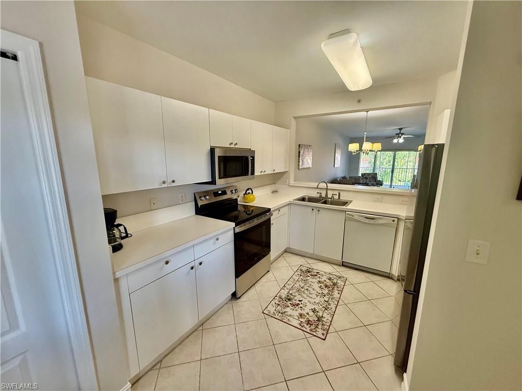 Photo of 7839 Regal Heron CIR #204, NAPLES, FL 34104 (MLS # 226016058)