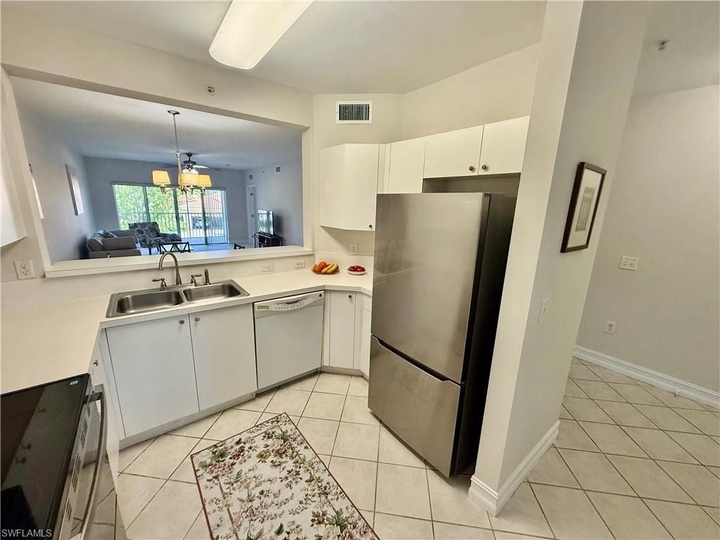 Photo of 7839 Regal Heron CIR #204, NAPLES, FL 34104 (MLS # 226016058)