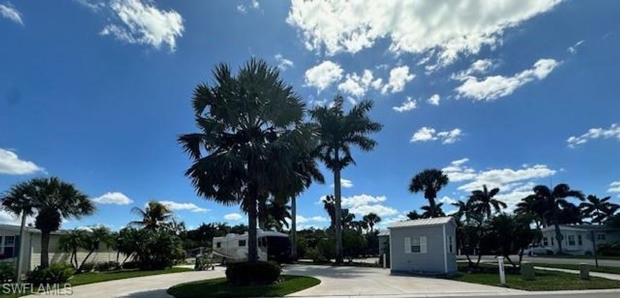 Exceptional oversized corner RV site offering beautiful lakefront views and added privacy. This prime property features tasteful landscaping and a convenient circular driveway for easy access and maneuverability.

Equipped with dual hookups, the site accommodates both pull-in and back-in RVs with ease. A 6x10 shed provides additional storage, making this a functional and well-appointed site.

Perfectly positioned to enjoy peaceful water views in a sought-after location within the community.