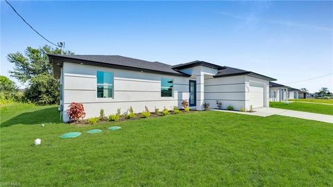 Photo of 2506 30th ST SW, LEHIGH ACRES, FL 33976 (MLS # 2025018799)