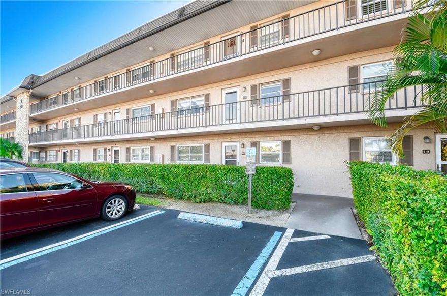 This inviting 2nd-floor condo in Country Club Manor, a 55 and better boutique community, offers a relaxed Naples lifestyle just minutes from downtown Olde Naples, vibrant Fifth Avenue South, renowned dining and shopping, and the sun-drenched Gulf beaches. Perfectly suited for year-round living or as a seasonal winter escape, the residence combines comfort, convenience, and an ideal location. Light and airy with desirable southwest exposure, the home is filled with natural light throughout the day. The kitchen features stainless steel appliances, white cabinetry, light countertops, crown molding, and a tray ceiling, creating a bright, timeless look. A neutral palette flows throughout the living spaces, providing the perfect canvas for a new owner to add personal taste and style. The primary suite features a walk-in closet and ensuite bath, and a generously sized guest bedroom with a full bath—ideal for visitors, a home office, or extended stays. The screened lanai overlooks a peaceful waterway, where gentle breezes, birdwatching, and tranquil views create a calming outdoor retreat. Country Club Manor is known for its intimate, friendly atmosphere and amenities that include a sparkling community pool, covered carport parking, and cable and internet included in the quarterly condo fee. Public golf courses are close at hand, along with everyday conveniences, medical facilities, and the best of Naples living. Whether you’re seeking a full-time residence or a lock-and-leave retreat, this inviting condo delivers an exceptional blend of lifestyle and location within a desirable 55+ community.