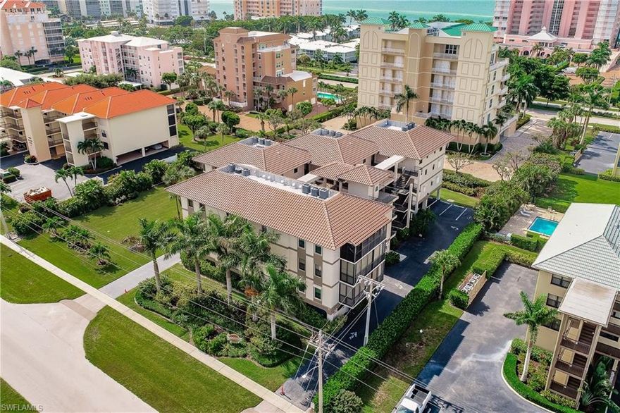 This large 1394 square foot, two bedroom two bath, end unit is just minutes walking distance to the South Beach access. It has updated light wood laminate flooring throughout. Impact windows are installed and sliders can be ordered. The kitchen counter with breakfast bar and back splash is newer along with new matching stainless steel appliances (frig, stove, dishwasher), new light fixtures and faucets throughout, and the living space has a new remote ceiling fan. The washer and dryer are new and the AC (inside and outside) was installed in 2019. There is plenty of closet space and extra storage next to the under building parking. New driveway pavers are coming. 14 day rentals are allowed three times a year once within a 30 day period of time.