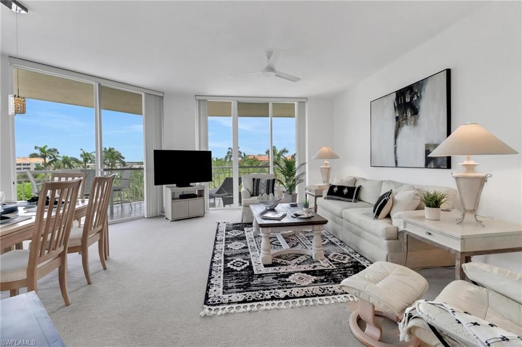 Photo of 4255 Gulf Shore BLVD N #201, NAPLES, FL 34103 (MLS # 225082684)