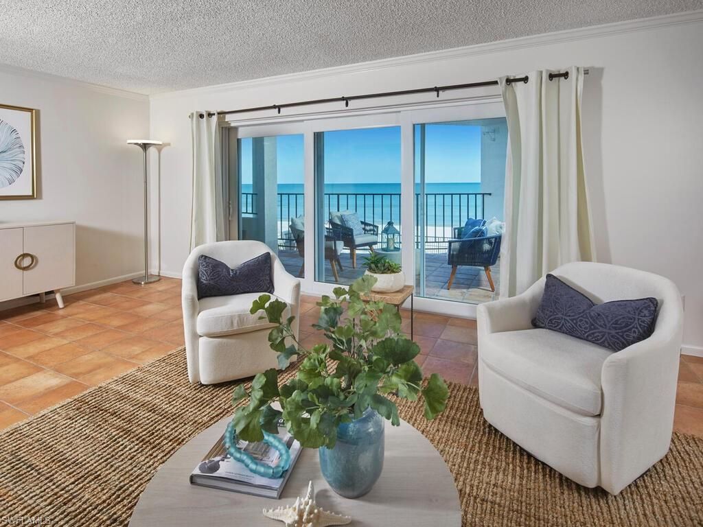 Photo of 3951 Gulf Shore BLVD N #201, NAPLES, FL 34103 (MLS # 225073334)