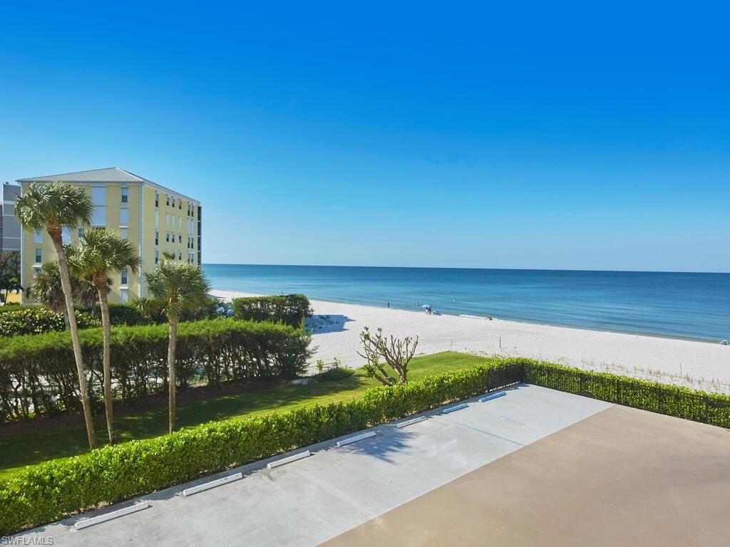 Photo of 3951 Gulf Shore BLVD N #201, NAPLES, FL 34103 (MLS # 225073334)