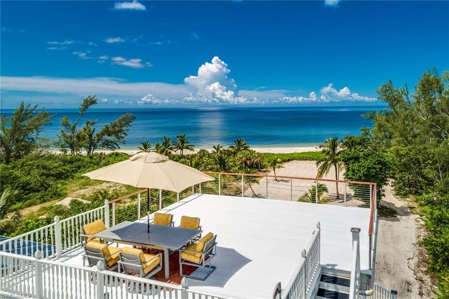 Spectacular, beachfront property on exclusive Keewaydin Island, a sustainable island paradise just minutes from Naples or Marco Island. This home has 3 bed, 3.5 bath with over 2200 sq ft under air and 2.5 acres. One side of the property is the Gulf of Mexico; on the other, the Intracoastal Waterway. Stunning views of the Gulf of Mexico and 100 feet of pure white sand can be seen from 3 levels of open-air decks. Enjoy private sunbathing and entertain in a uniquely memorable setting. There is deep water access along Intracoastal Waterway and a large boat dock with lift. This island is boat-only access ensuring the utmost privacy. No compromise required in this state of the art, completely sustainable, off-the-grid property. The modern kitchen has a Viking stove and a whole-house reverse osmosis water filtration system. This home also has the latest solar, battery and generator technologies. Amenities include an elevator, fireplace, even a sauna, volleyball court, kayaking & paddle boarding. The home can easily access the internet and satellite TV. Keewaydin is peaceful and serene with an abundance of flora and fauna. This offering is a special opportunity for the discerning buyer.