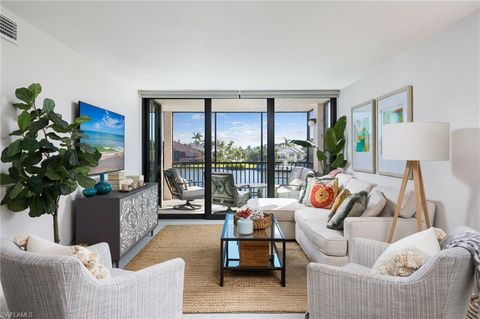 Photo of 10562 Gulf Shore DR #202, NAPLES, FL 34108 (MLS # 225073530)