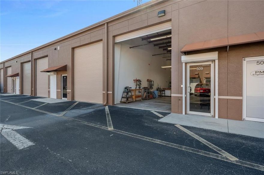 RARE affordable Naples warehouse space, currently fitted for wood shop, or perfect option for vehicles or other storage, man cave or she-shed.  Property includes private office and half bath.  Recently updated air conditioning.  Electric Hurricane shutter over front glass door.  Offers more flexibility than many other similar units.
Phenomenal location on Enterprise Ave. just off Livingston Road in the heart of Naples.  Very easy 24/7 access.  Park is gated for security in the evenings.  Convenient to Naples Airport.