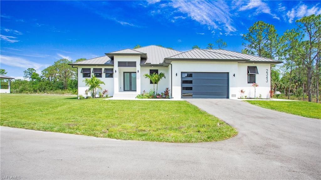 Photo of 2343 Oil Well RD, NAPLES, FL 34120 (MLS # 226019543)