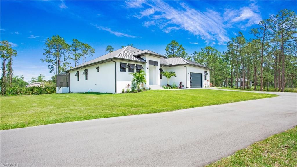 Photo of 2343 Oil Well RD, NAPLES, FL 34120 (MLS # 226019543)