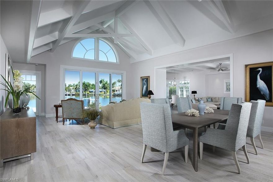 Meticulously renovated and perfectly sited with a spectacular open view of the wide waters of Treasure Cove, this exceptional architectural achievement is led by Jeff Harrell. This home offers an open floor plan with attentive detail that adds to the light and airy feel of this coastal residence. With over 4,600 square feet of living area on one level, this four-bedroom home with private study includes an open kitchen highlighted with Taj Mahal natural stone, Wolf and Sub-Zero appliances and a separate entertainment room featuring a 147-bottle Sub-Zero wine cooler and ice maker, perfect for entertaining with comfort. The understated elegance continues throughout the home with a brilliantly appointed master, a walk-in closet and bath highlighted with Calacatta Borghini marble. The interior of the residence easily transitions to the exterior, lined with tropical landscaping and euro pavers that surround the pool and spa. A 48-foot concrete floating dock with 24,000-pound lift brings the home's water theme full circle. This property qualifies for immediate membership to the Port Royal Beach Club.