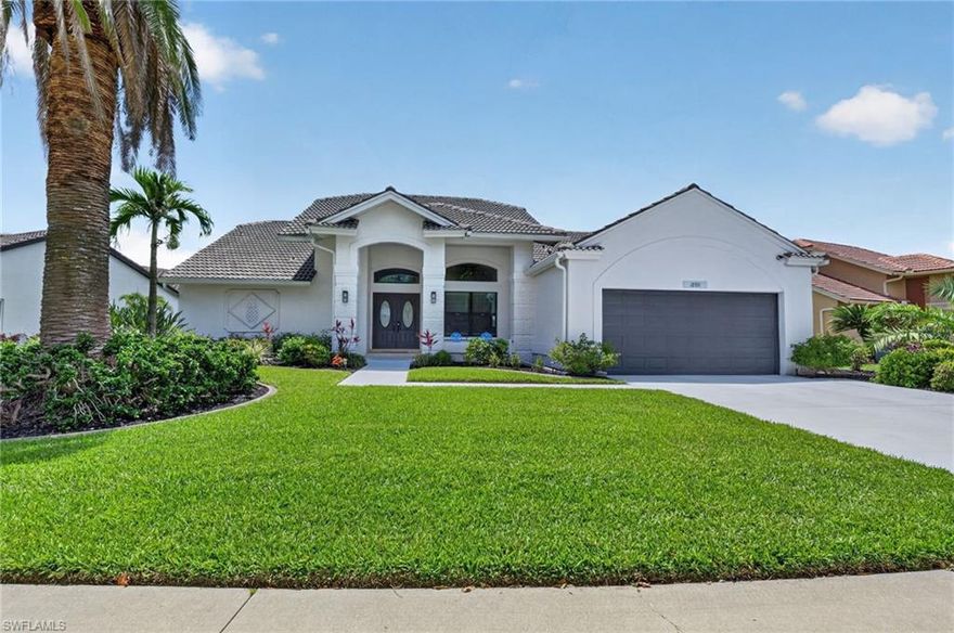 Completely and professionally remodeled with high-end appointments. Large spacious rooms, 12-foot ceilings, with a beautiful travertine stone floor throughout the kitchen and living areas. All new hurricane rated PGT impact windows and doors, quartz countertops, stainless-steel appliances, new A/C system, and a fantastic built-in, electric fireplace. All completed within the last three years. Fresh sod and landscaping, with absolutely beautiful lake and golf course views. Rear lanai has rough in for outdoor kitchen and there is room for a pool. Kelly Greens GC is that perfect location with beaches, shops, restaurants, and grocery stores all within biking distance. The world-famous islands of Sanibel/Captiva and Ft Myers Beach are just minutes away. The centerpiece of Kelly Greens is a Par 72 championship golf course designed by architect Gordon Lewis. The Bermuda grass golf course offers a challenge to golfers at all skill levels. Amenities also include a beautiful new Clubhouse with full service restaurant, weight and exercise room, Golf Pro Shop, Tennis courts, and swimming pool.