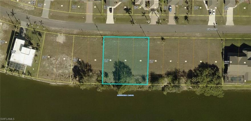 Don’t miss this opportunity to own a prime triple waterfront lot on the sought-after Hermosa Canal, offering nearly 15,000 square feet of space! Located in a peaceful, quiet community yet just minutes from shopping, dining, and everyday conveniences, this property offers the perfect balance of privacy and accessibility. With Cape Coral continuing to grow, now is the time to invest while prices remain attractive. No assessments due and no known owl or gopher tortoise restrictions, making this expansive lot ideal for building your dream home or holding as a smart investment.
