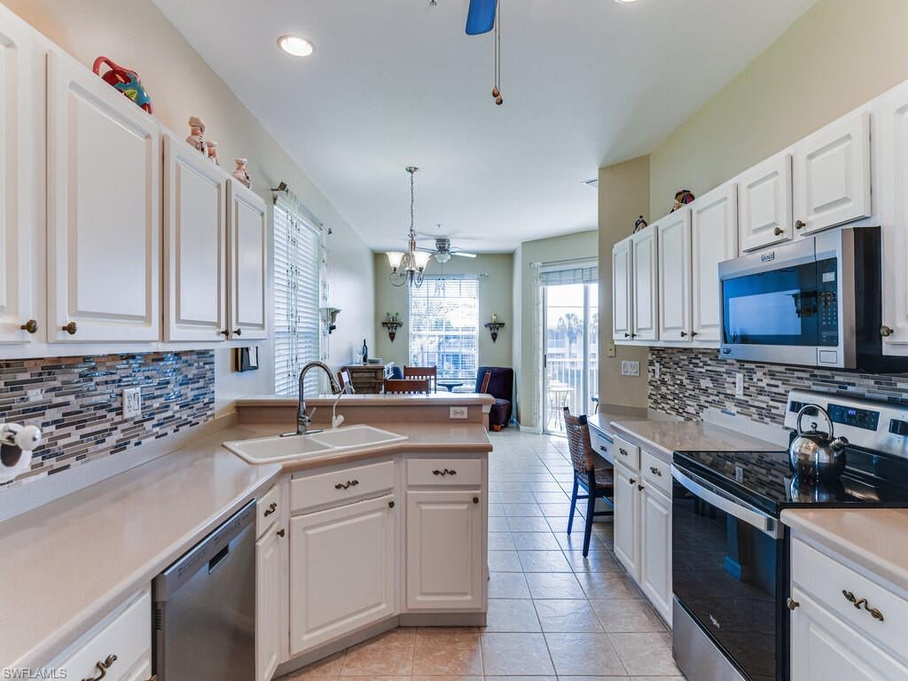 Photo of 2220 Arielle DR #2010, NAPLES, FL 34109 (MLS # 224007088)