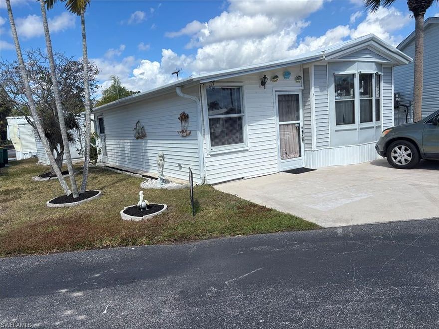 PERFECT WINTER GET AWAY OR SWEET YEAR ROUND RESIDENCE FEATURING LARGE KITCHEN/DINING ROOM, SPACIOUS LIVING ROOM AND TWO FULL BATHS, 1 BEDROOM, WITH BEAUTIFUL WOOD LAMINATE FLOORING. ENOUGH PARKING FOR TWO VEHICLES AS WELL AS A PRIVATE PATIO OUT BACK. ENCHANTING SHORES IS AN EXTREMELY WELL MAINTAINED AND MANAGED 55 PLUS RETIREMENT PARK WITH MULTIPLE AMENETIES AND ACTIVITIES AS WELL AS HAVING ACCESS TO THE GULF OF AMERICA. BOAT PARKING IS AVAILABLE FOR A NOMINAL ANNUAL FEE. ESC IS CENTRALLY LOCATED BETWEEN DOWNTOWN NAPLES AND ITS GLAMOROUS STORES, EATERIES AND BEACHES AND LOVELY, POPULAR MARCO ISLAND AND ALL IT HAS TO OFFER. THIS IS AN AFFORDABLE CHOICE TO LIVE THE HIGH LIFE IN ONE OF THE MOST POPULAR VACATION SPOTS IN THE COUNTRY.