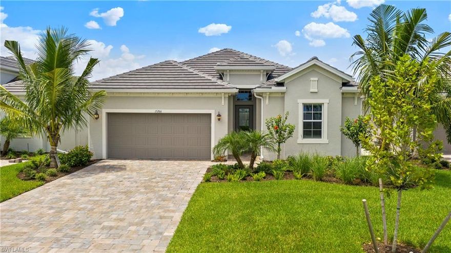 Absolutely stunning coastal contemporary home located on the 238-acre lake in Vista Wild Blue which allows boating and all water activities right from your own private dock! This rarely available Maria Floor plan is one of the most popular in the community! Offers 4 bedrooms, 3 full baths, and 2,247 square feet of living space. Includes the modern designs featuring white shaker cabinets, quartz tops, GE appliances, wood tile floors, and the rarely available gas cooktop. The outdoor living space is absolutely amazing with the pool deck was done in pavers, pool/spa, and picture frame lanai screen with unbelievable long water view. Wild Blue is luxury lakeside living, featuring an unmatched 2,100 acres of lakes and preserves! The amenity center will be located on a 20-acre peninsula offering unbelievable mile long water views from the clubhouse and pools. The facilities include a Boat Launch and Marina, Tennis Center, Pickleball, Fitness Center, Yoga Lawn, Resort Style Pool, Lap Pool, Pool Café & Bar, Member’s Pub, dining, Beach, Cabanas and more. Book your showing today!