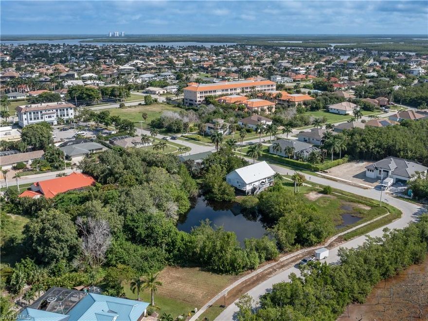 Seize the opportunity to build your dream home on these two combined lots with lakefront all in one! Quite street and no neighbors across the street. Marco Island Florida unique opportunity. The Lake is full of fish and surrounded by mangroves. Perfect for buyers looking to create a custom coastal retreat. Whether you're planning a luxurious lake front estate or a vacation getaway the potential for these two lots combined is limitless. Fill land to customize your home's footprint or build a dock over the water, the land and water is yours.