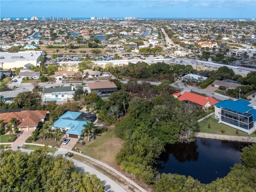 Seize the opportunity to build your dream home on these two combined lots with lakefront all in one! Quite street and no neighbors across the street. Marco Island Florida unique opportunity. The Lake is full of fish and surrounded by mangroves. Perfect for buyers looking to create a custom coastal retreat. Whether you're planning a luxurious lake front estate or a vacation getaway the potential for these two lots combined is limitless. Fill land to customize your home's footprint or build a dock over the water, the land and water is yours.