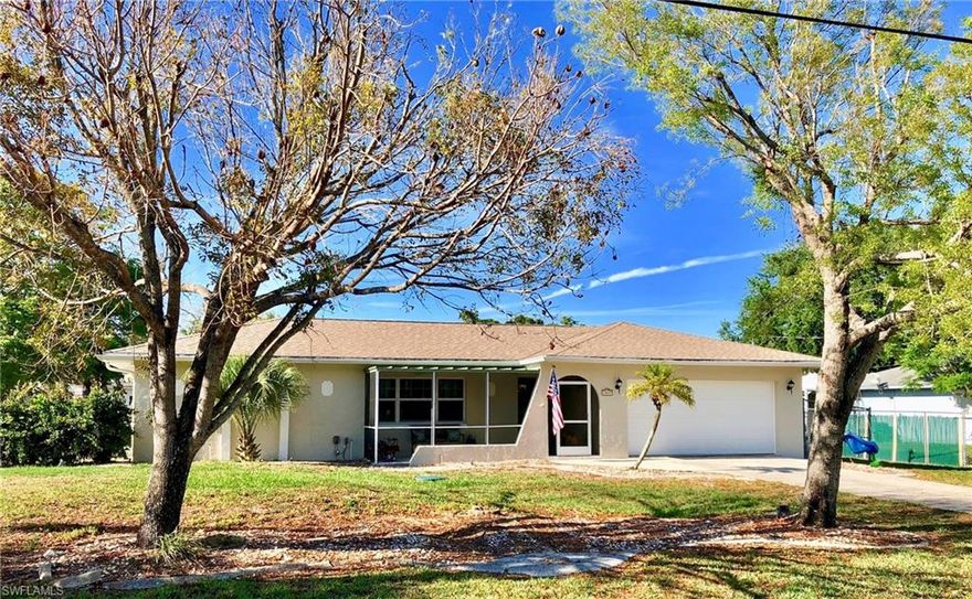 Adorable Country Chic Pool Home in a Quiet North Fort Myers Neighborhood.  This immaculate and well maintained home has so much to offer.  Over 1800 sq ft with a screened front porch, an open floor plan, living room, family room, dining room, pool bath, 3 bedrooms, plus garage space has been utilized to add additional storage space.  Beautiful neutral diagonal tile in living areas and carpet in the bedrooms.  Recents upgrades include a Beautiful New kitchen with granite, stainless appliances, a farmhouse sink, remodeled master suite with sliders to the lanai, fresh paint inside and out, new hot water heater, newer washer and dryer, new roof over lanai, new pool equipment, and newer pool deck pavers. Just sit back and relax by the pool or watch the kids enjoy playing on their play set in the big backyard. Also has a shed for extra storage.  Home is connected to City water.  Tucked away yet quick and easy access to 75 and 41.