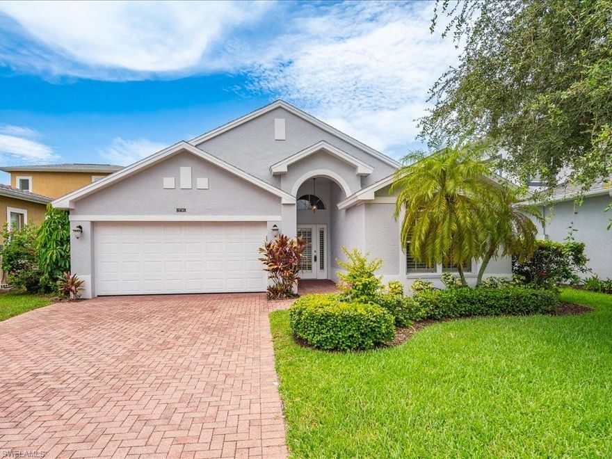 Immaculate 3 bedroom and 2 full bath updated home located in the highly desirable community of Queens Park.  Open and spacious floor plan with living areas that all look out onto the pavered screened lanai and pool.  The newer kitchen features granite counter tops, stainless steel appliances and a generous breakfast nook. Other highlights include; new roof & garage door in 2019, solar heated pool, paver driveway, volume ceilings, high end luxury vinyl and tile flooring throughout, private backyard with lush landscaping and low HOA fees. Residents of Queens Park enjoy the close proximity to 5th Ave South, gulf beaches, restaurants and shopping.