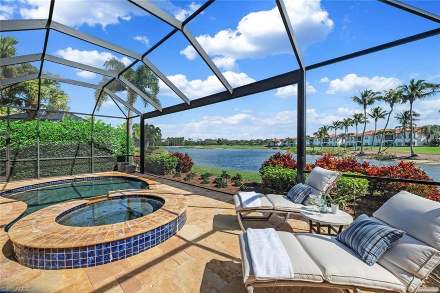 Welcome to your new home! IMMEDIATE GOLF MEMBERSHIP AVAILABLE with this beautifully renovated chic, stylish, comfortable home, with lake views and renovations at every glance. Classic light, stone flooring, open-concept, gourmet kitchen with abundant cabinetry, new island, quartz counters, new tile backsplash, enhanced with SubZero, Wolf and Miele appliances.  Custom, new bar with wine cabinets, beverage refrigerator, completely renovated gas fireplace, custom cabinetry/shelves, and complete new guest bath.  After a day in paradise, it's dinner al fresco on the lanai, grilling in your custom, outdoor kitchen, all with the backdrop of beautiful, Naples sunset colors in the sky.  The impact windows, doors and hurricane screen and a new roof in 2018, makes for a peace of mind. This welcoming home has it all, and your family and friends will crave for invitations to come join you in Naples! Two-car garage, with cabinetry, fridge...and a golf cart! Close to the Grey Oaks Club amenities of a 30,000 sq. ft. Wellness Center, Pool Café, resort pool, three golf courses, and conveniently located in the center of Naples, minutes from the beach, downtown, shopping and restaurants. Welcome home!