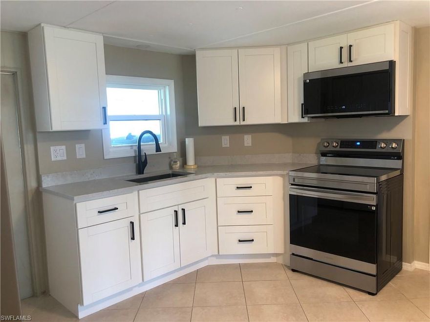 This home has a newer roof with transferable warranty, new gutters, new window & doors, new hot water heater, freshly painted inside, and is remodeled ready for a new owner. Two bedrooms, large kitchen, living room & dining room area has lots of natural light.  This is a 55+ community where you own the land and HOA fees are only $95 monthly. Furnishings are negotiable.