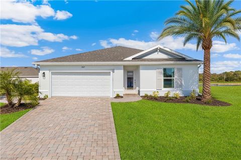 Photo of 379 RADIANT SUN LN, LEHIGH ACRES, FL 33936 (MLS # 226019451)