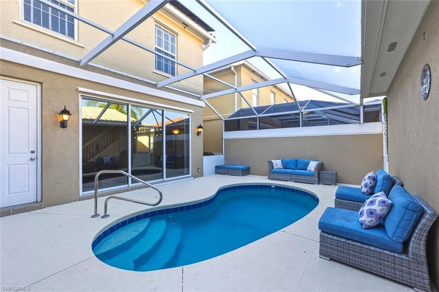 JUST LISTED this two-story DiVosta Cayman POOL townhome featuring solid poured-concrete construction, a private heated pool, and one of the most advanced energy systems in the community. This four-bedroom, three-bath residence offers tile and luxury vinyl plank flooring throughout, an open and airy main living area, and a flexible first-floor bedroom with full bath and separate entry—ideal for guests, multigenerational living, or a home office. Upstairs, the primary suite opens to a private balcony with tranquil lake views and glowing western sunsets, complemented by a spa-style bath and generous walk-in closets as well as two additional guest rooms, guest full bathroom, and laundry room with extra storage and a utility sink.

 A full solar electric system paired with Tesla Powerwall batteries functions like a whole-home generator, dramatically reducing reliance on the power grid—average electric bills remain under $50 per month, with occasional utility credits returned during lower-usage months. Additional highlights include a detached two-car garage equipped with a roll-down screen and space ideal for a lounge or entertainment area, plus a golf cart included for effortless community living. Located within Verona Walk, residents enjoy a 24-hour manned guardhouse, resort-style lagoon and lap pools, on-site restaurant and café, fitness center, miles of walking trails, tennis, pickleball, bocce, basketball, post office, gas station, car wash, full-time activities staff, and on-site management—offering a true resort lifestyle just minutes from Naples and Marco Island beaches, shopping, dining, and medical facilities.