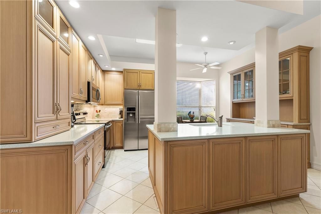 Photo of 1875 Les Chateaux Blvd Blvd #104, NAPLES, FL 34109 (MLS # 226004517)