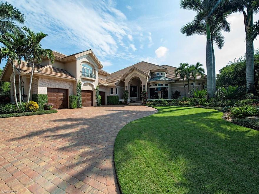 This beautifully appointed residence is a true marvel, having undergone a stunning transformation. Upon crossing the threshold of the custom front doors, you step into a light & bright living room adorned with intricately crafted ceiling details. Your gaze is immediately captivated by the panoramic vista of the pool, lanai, and serene expanse of the lake beyond.  Spanning over 5,000 SF of living space, this extraordinary abode boasts a masterfully designed kitchen that seamlessly flows into a comfortable great room, an elegant formal dining area, and versatile bar seating for casual dining or breakfast. Stepping out onto the screened lanai, you'll find an ideal setting for al fresco dining, relaxation in cozy seating enclaves, and use the outdoor BBQ for evening enjoyment. The owner’s suite offers a sense of opulence with its two expansive walk-in closets, the generous master bath provides double vanities, spacious walk-in shower, and sumptuous soaking tub. This home offers an array of amenities, including a fitness room, an integrated surround sound system, state-of-the-art security system, water treatment system, 3-car garage.  Whole-house generator and hurricane protection.